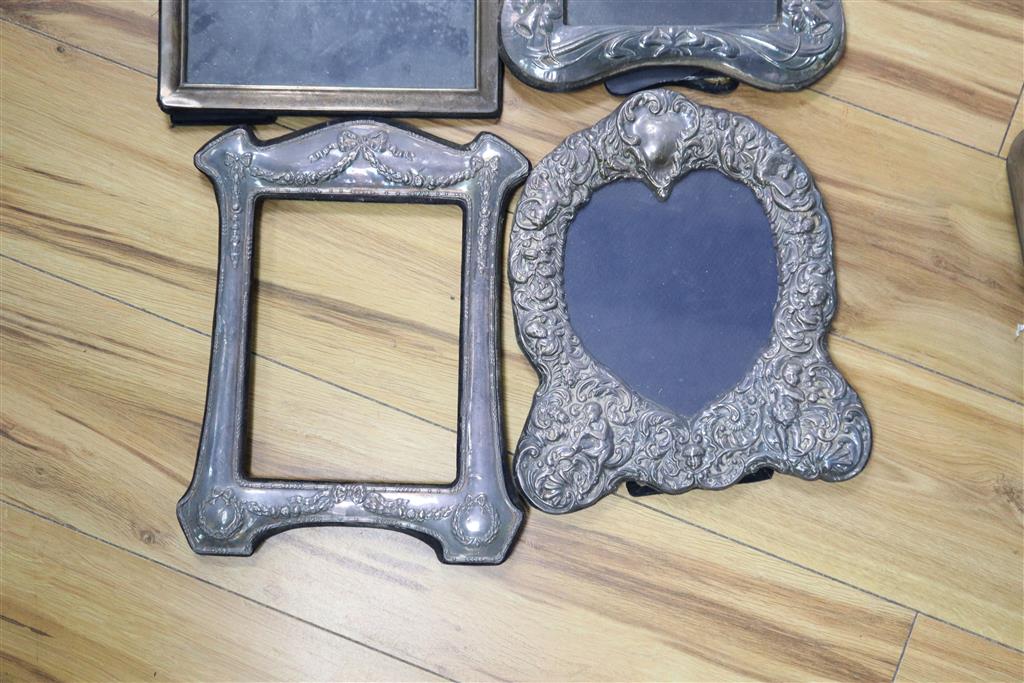 Six assorted large modern silver mounted photograph frames, largest 39cm.